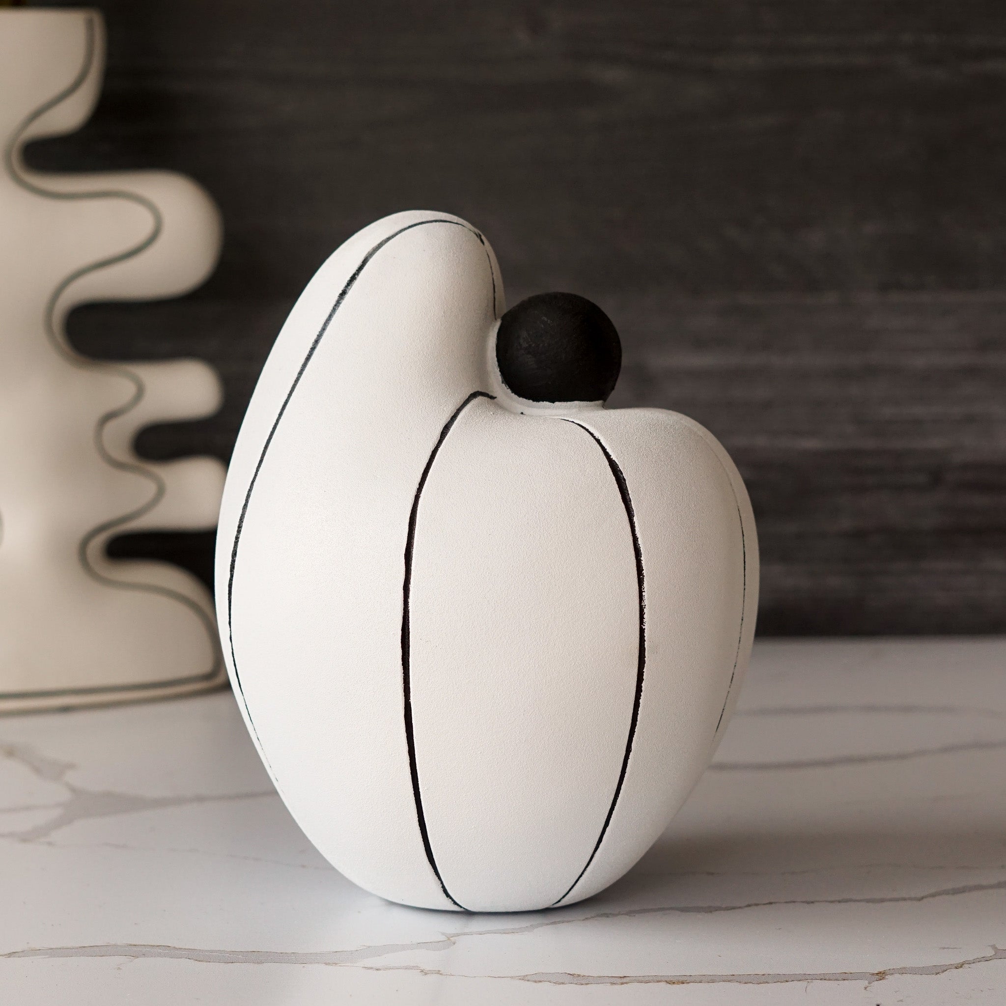 Cartoon Clutch Sculpture