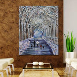 family walking under trees